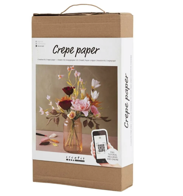 Kartonnen verpakking met een omslag met een DIY pakket bloemen van crêpe papier.